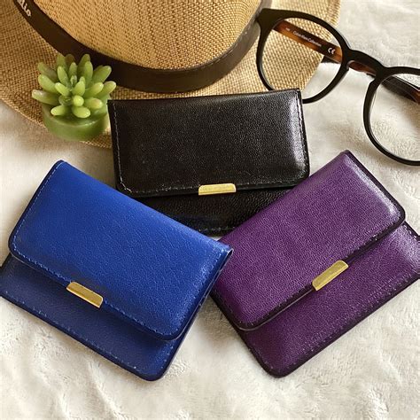 designer leather wallets women's.